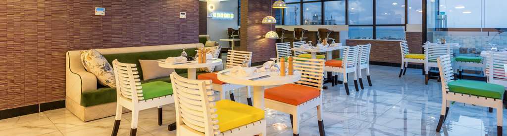 Golden Tulip Dar Es Salaam City Center Hotel Restaurant photo